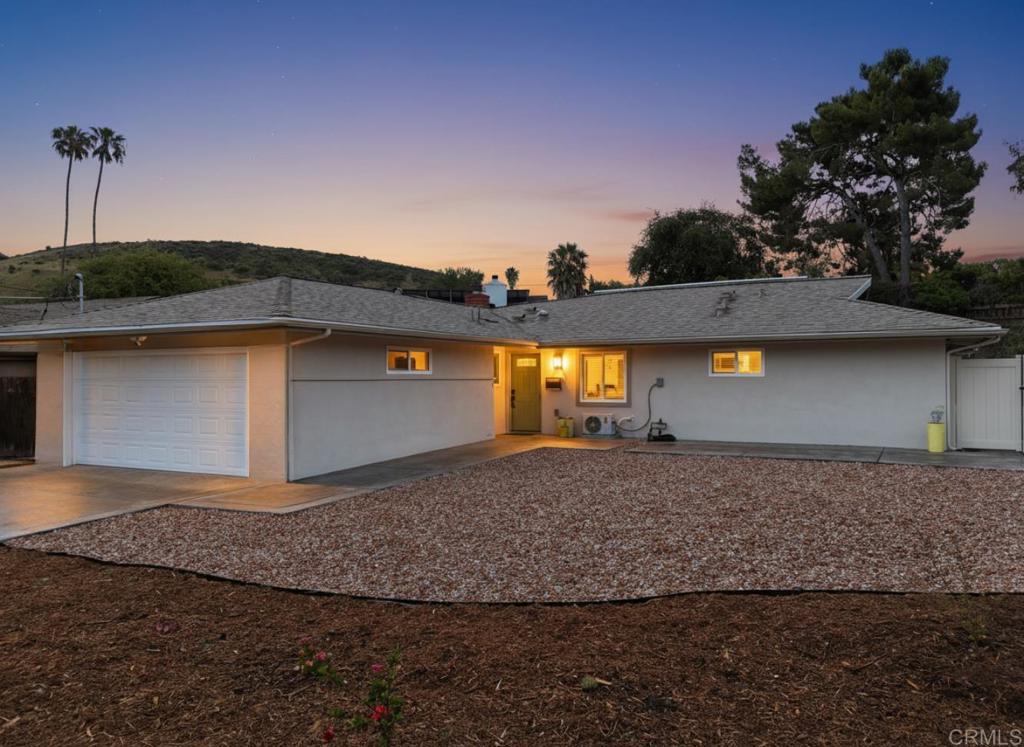 12401 Metate Lane Poway, CA 92064 - Photo 1 of 42 a front view of a house with a yard