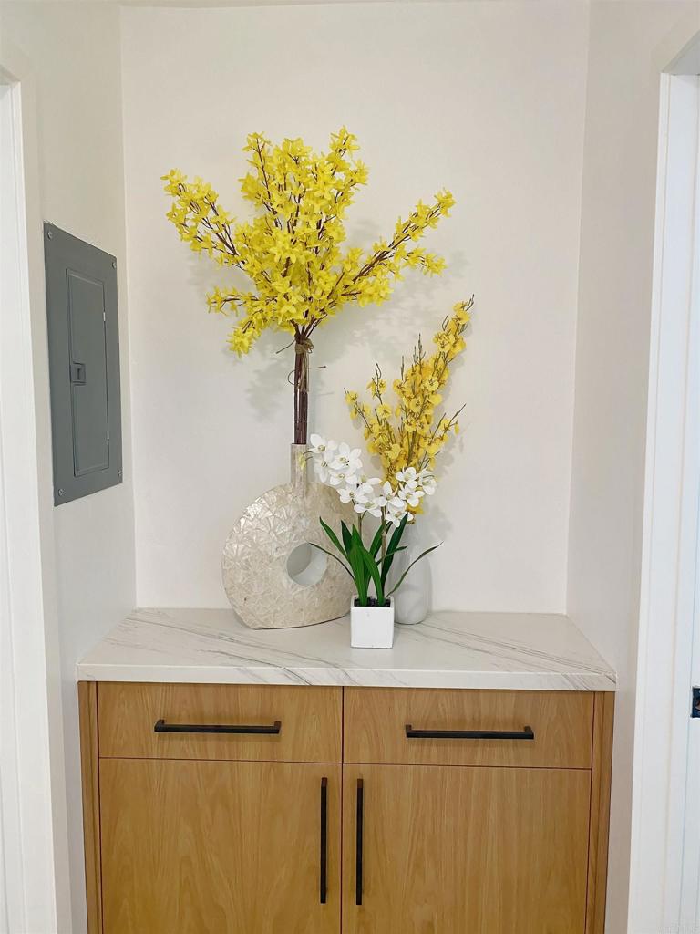 12401 Metate Lane Poway, CA 92064 - Photo 19 of 42 a vase of flowers sitting on a table