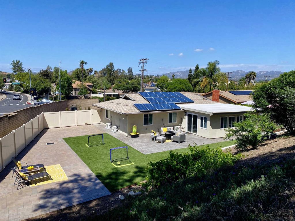 12401 Metate Lane Poway, CA 92064 - Photo 30 of 42 a view of a house with pool and chairs