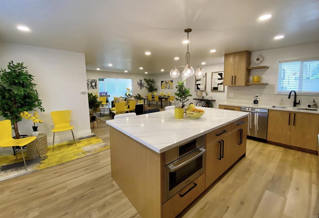 12401 Metate Lane Poway, CA 92064 - Photo 8 of 42 a kitchen with a stove and a refrigerator