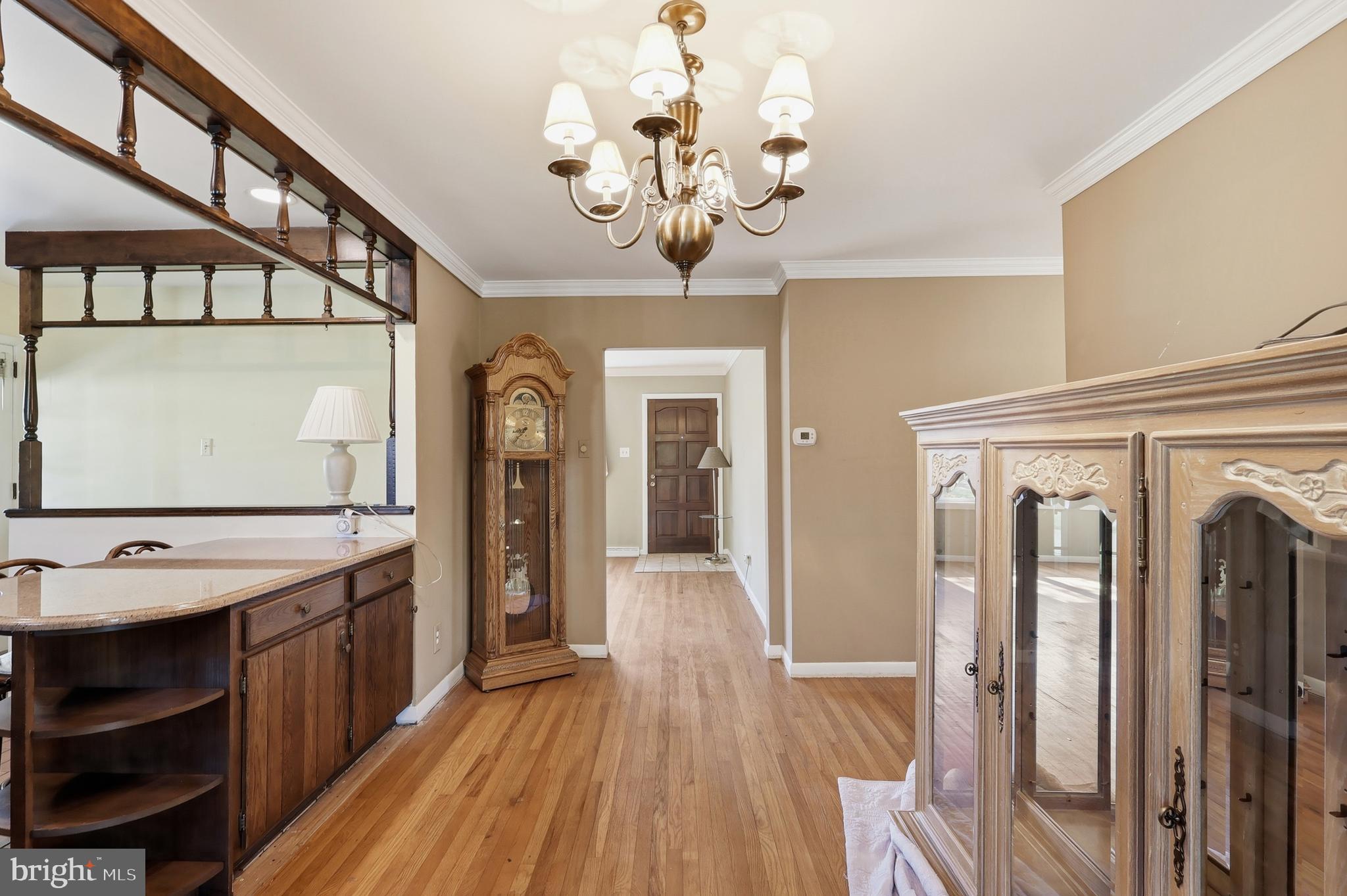 2015 Spring Mill Road Conshohocken, PA 19428 - Photo 12 of 39 a view of a hallway with wooden floor and staircase