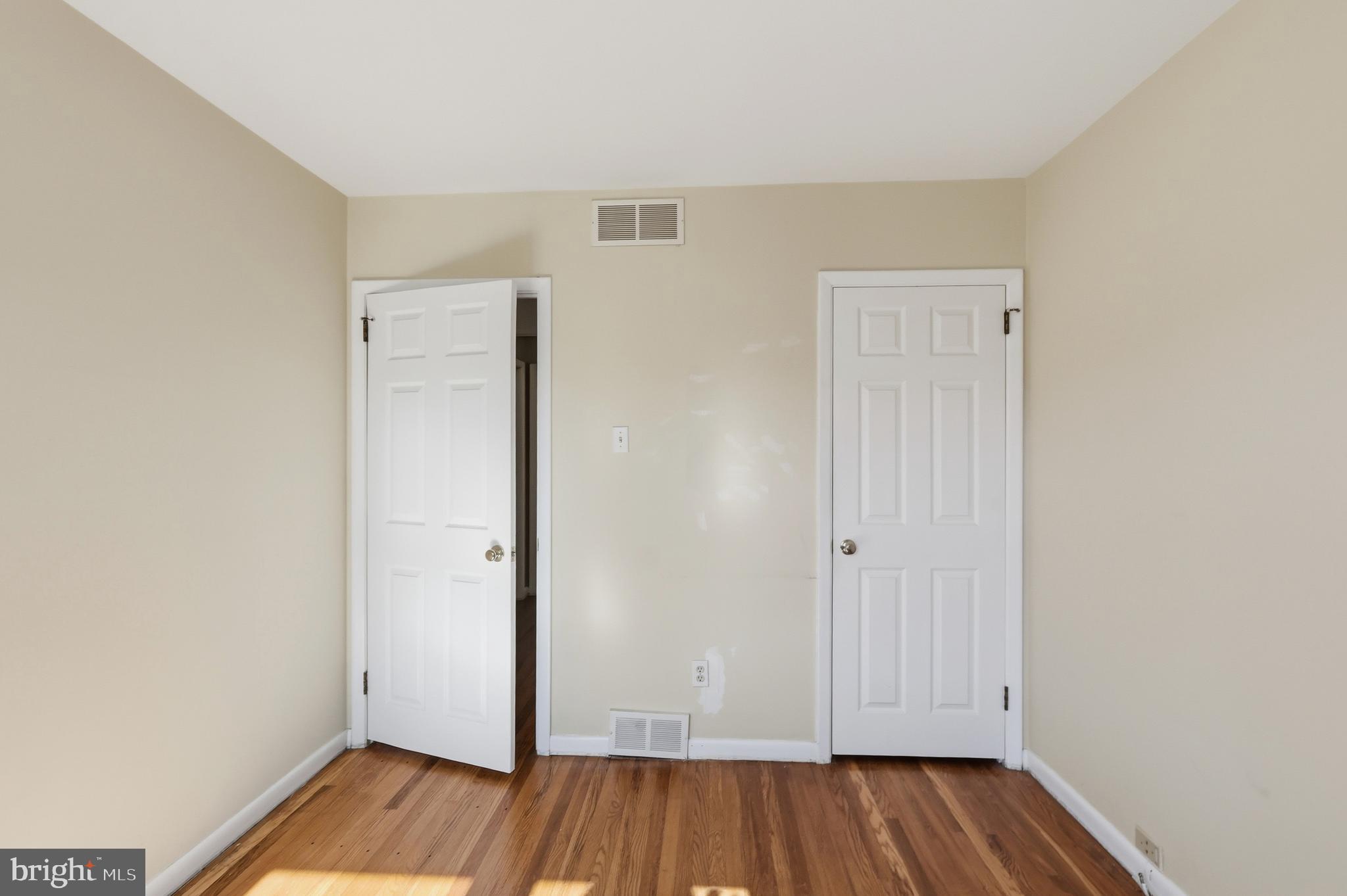 2015 Spring Mill Road Conshohocken, PA 19428 - Photo 17 of 39 an empty room with wooden floor