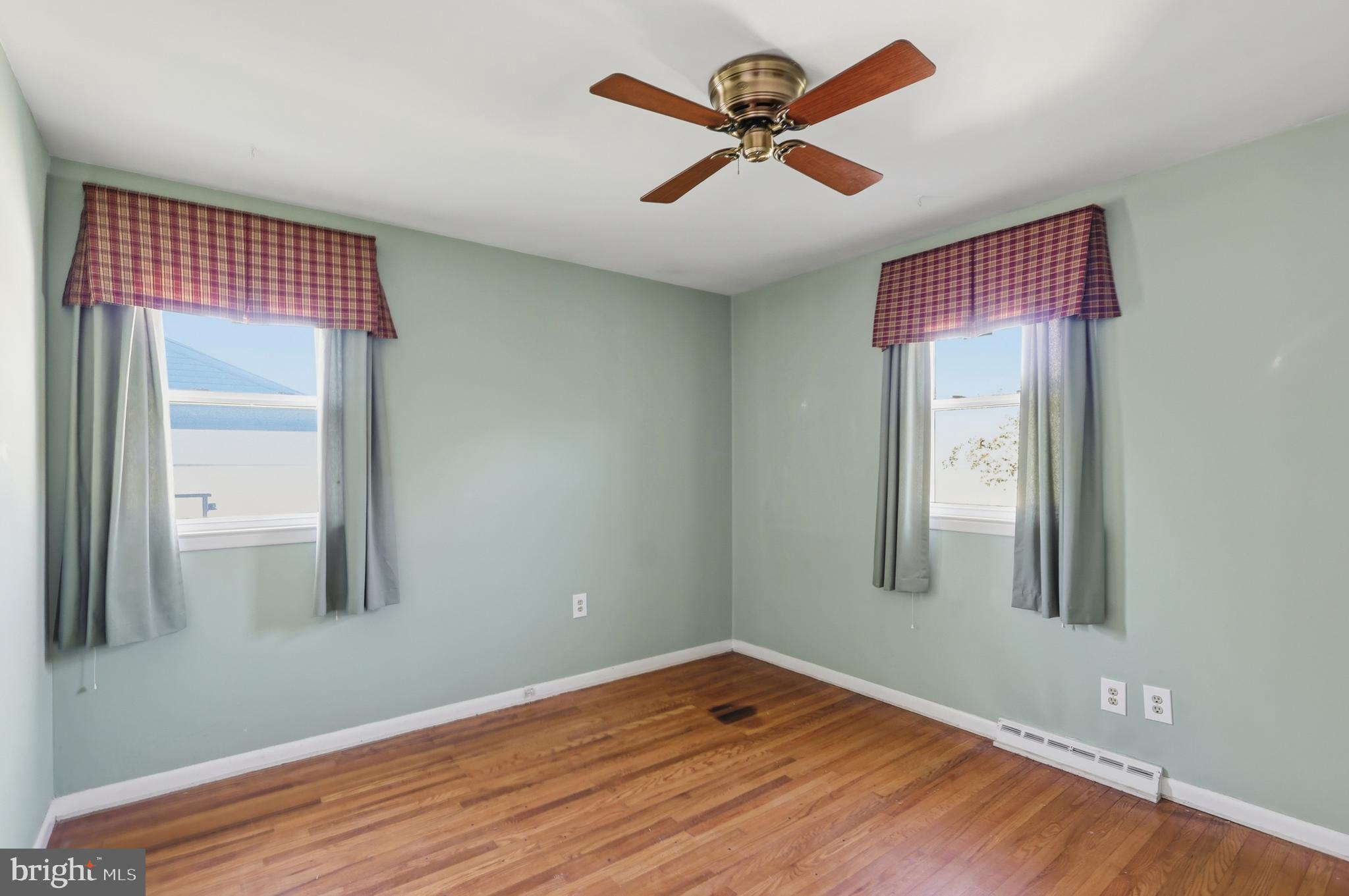 2015 Spring Mill Road Conshohocken, PA 19428 - Photo 20 of 39 a view of a big room with wooden floor and windows
