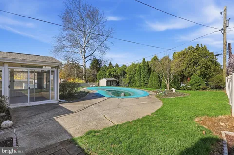 a house with garden in front of it