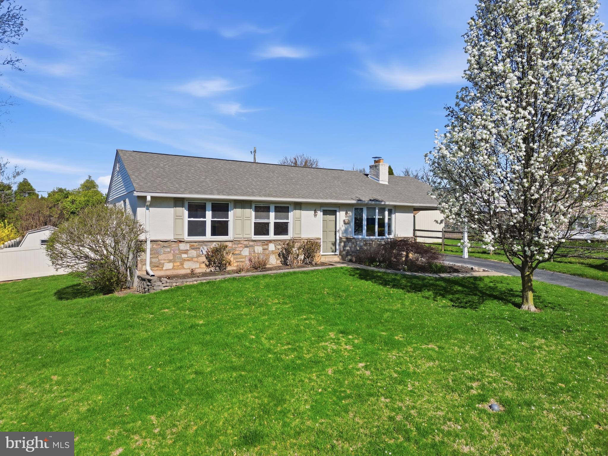 2015 Spring Mill Road Conshohocken, PA 19428 - Photo 4 of 39 a front view of a house with a garden