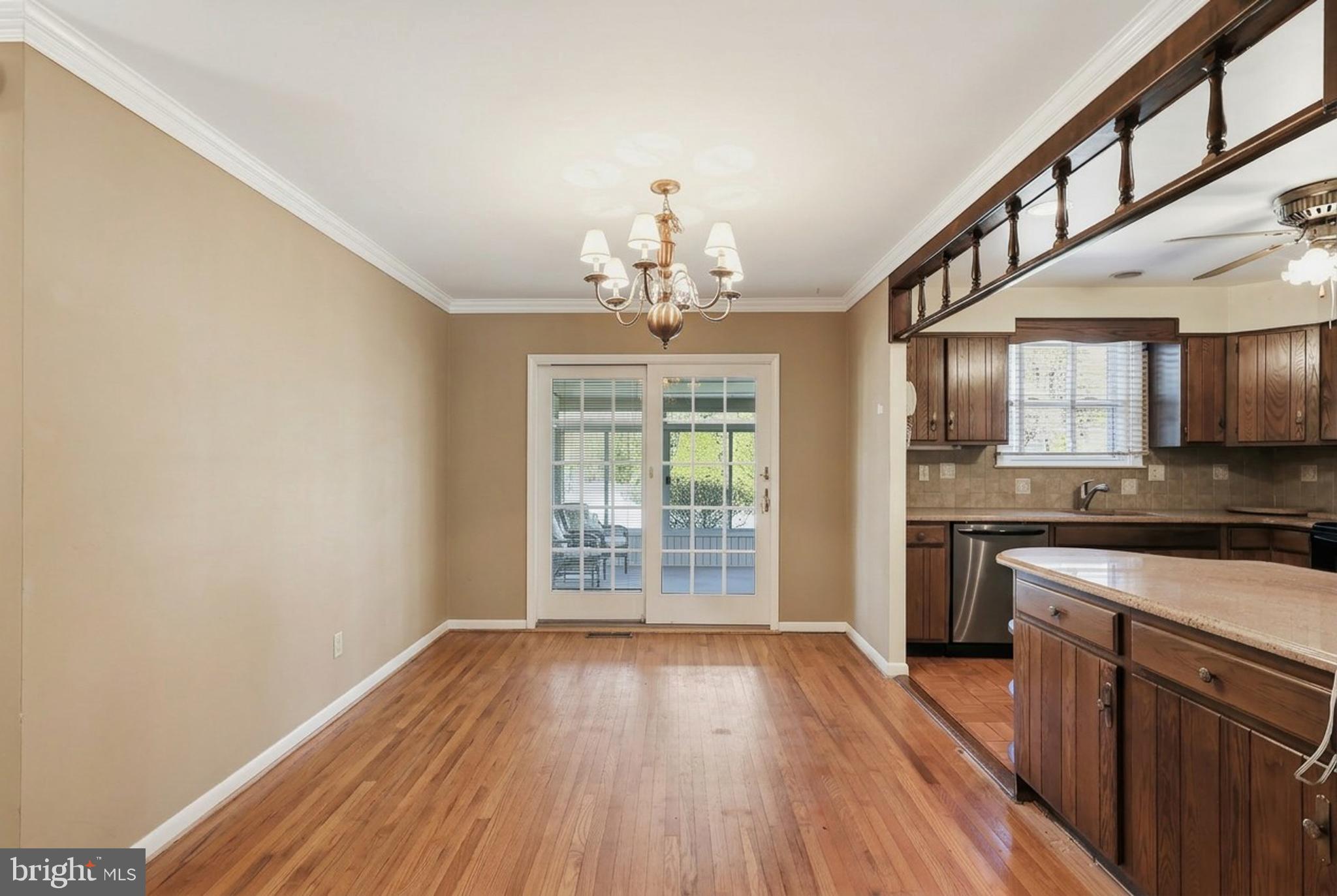2015 Spring Mill Road Conshohocken, PA 19428 - Photo 10 of 39 a view of a kitchen with a sink wooden floor and cabinets