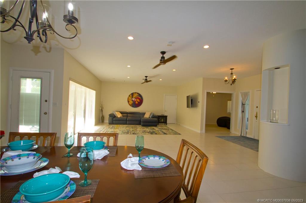1790 Northwest River Trail Stuart, FL 34994 - Photo 12 of 44 a kitchen with a table and chairs in it
