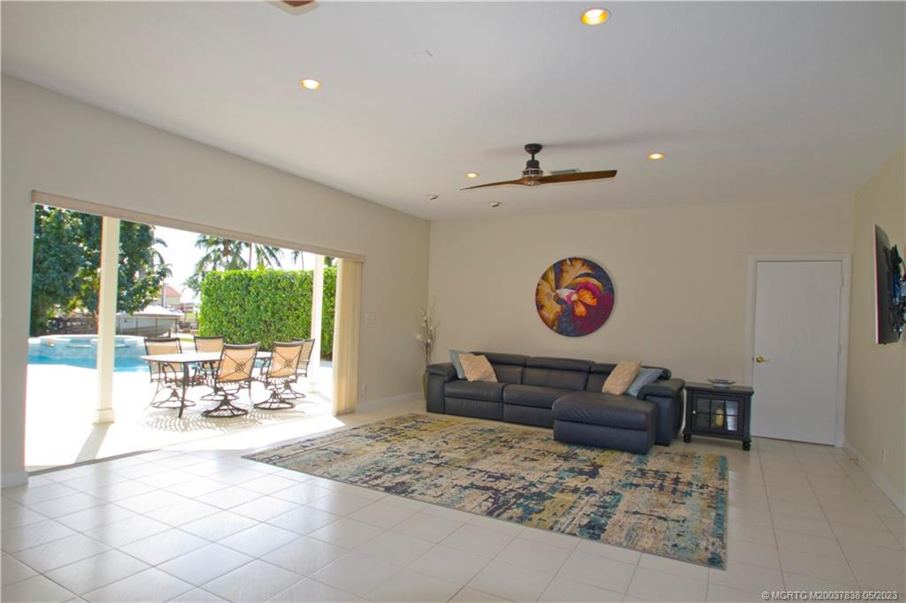 1790 Northwest River Trail Stuart, FL 34994 - Photo 13 of 44 a bedroom with furniture and a large window