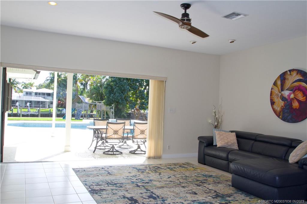 1790 Northwest River Trail Stuart, FL 34994 - Photo 14 of 44 a living room with furniture and a window