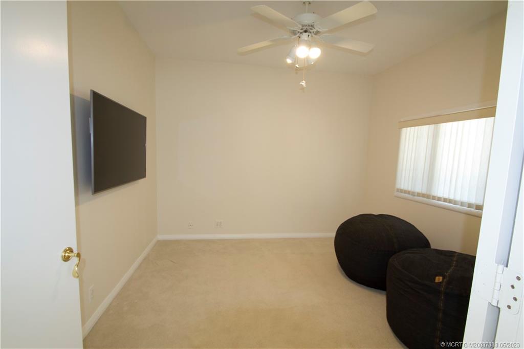 1790 Northwest River Trail Stuart, FL 34994 - Photo 16 of 44 a view of entryway with window and ceiling fan