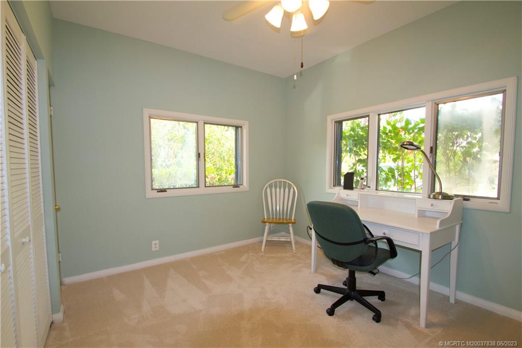 1790 Northwest River Trail Stuart, FL 34994 - Photo 20 of 44 a view of a workspace with furniture and a window