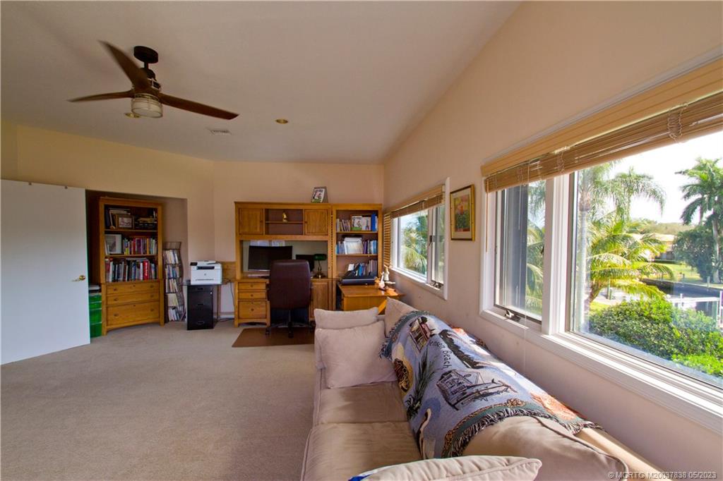 1790 Northwest River Trail Stuart, FL 34994 - Photo 36 of 44 a living room with furniture and a large window