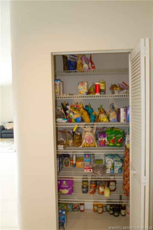 1790 Northwest River Trail Stuart, FL 34994 - Photo 40 of 44 a room with lots of bottles of alcohol