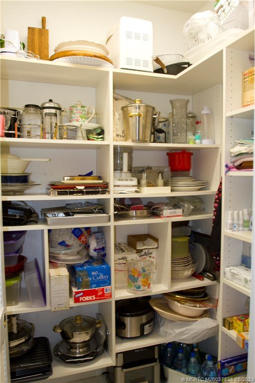 1790 Northwest River Trail Stuart, FL 34994 - Photo 41 of 44 a kitchen with a stove and cabinets