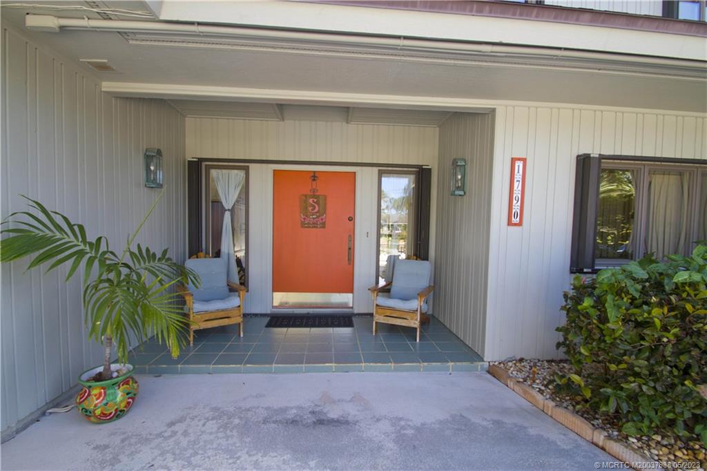 1790 Northwest River Trail Stuart, FL 34994 - Photo 5 of 44 a view of livingroom with furniture and floor to ceiling window