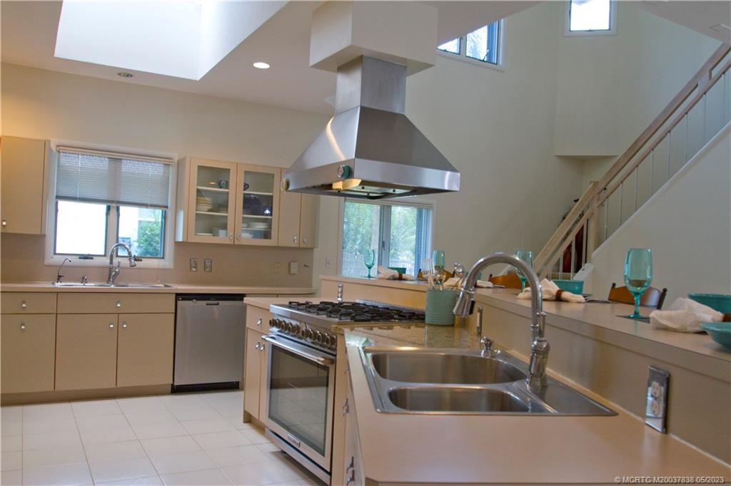 1790 Northwest River Trail Stuart, FL 34994 - Photo 7 of 44 a kitchen that has a sink and a stove