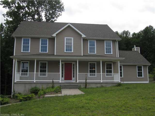 81 Rosemary Road Prospect, CT 06712 - Photo 1 of 1 a front view of a house with a garden