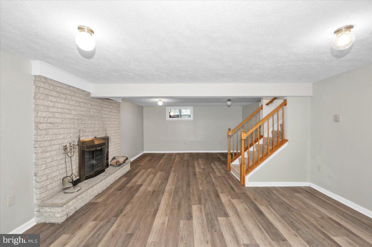 5536 Catholic Church Road Jefferson, MD 21755 - Photo 28 of 67 Basement Recreation Room with fireplace
