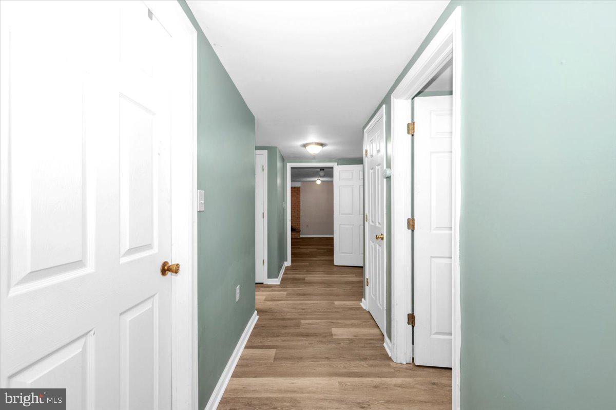 5536 Catholic Church Road Jefferson, MD 21755 - Photo 32 of 67 Inviting hallway with fresh hues.