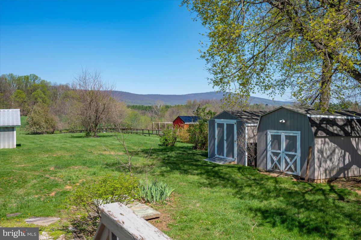 5536 Catholic Church Road Jefferson, MD 21755 - Photo 52 of 67 Rear Yard with 3 storage sheds