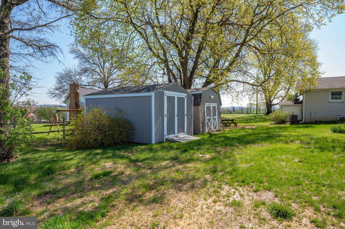 5536 Catholic Church Road Jefferson, MD 21755 - Photo 60 of 67 Rear Yard with 3 storage sheds