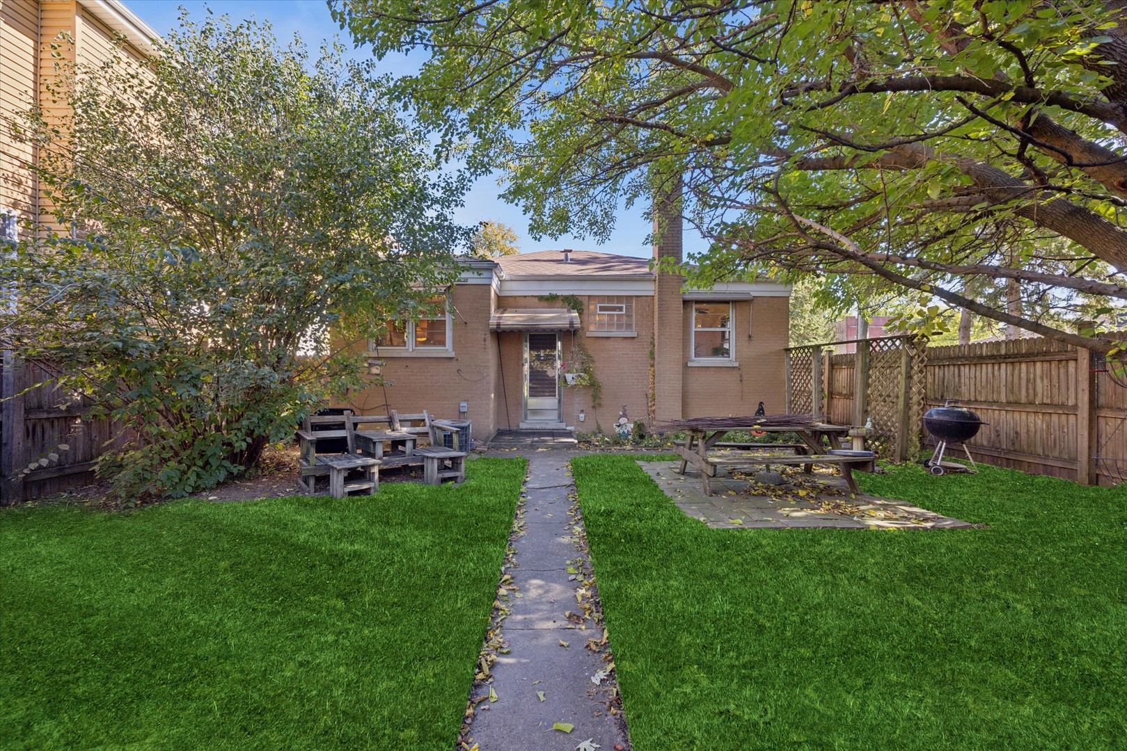 3334 Prairie Avenue Brookfield, IL 60513 - Photo 15 of 18 a view of a chair and table in backyard of the house