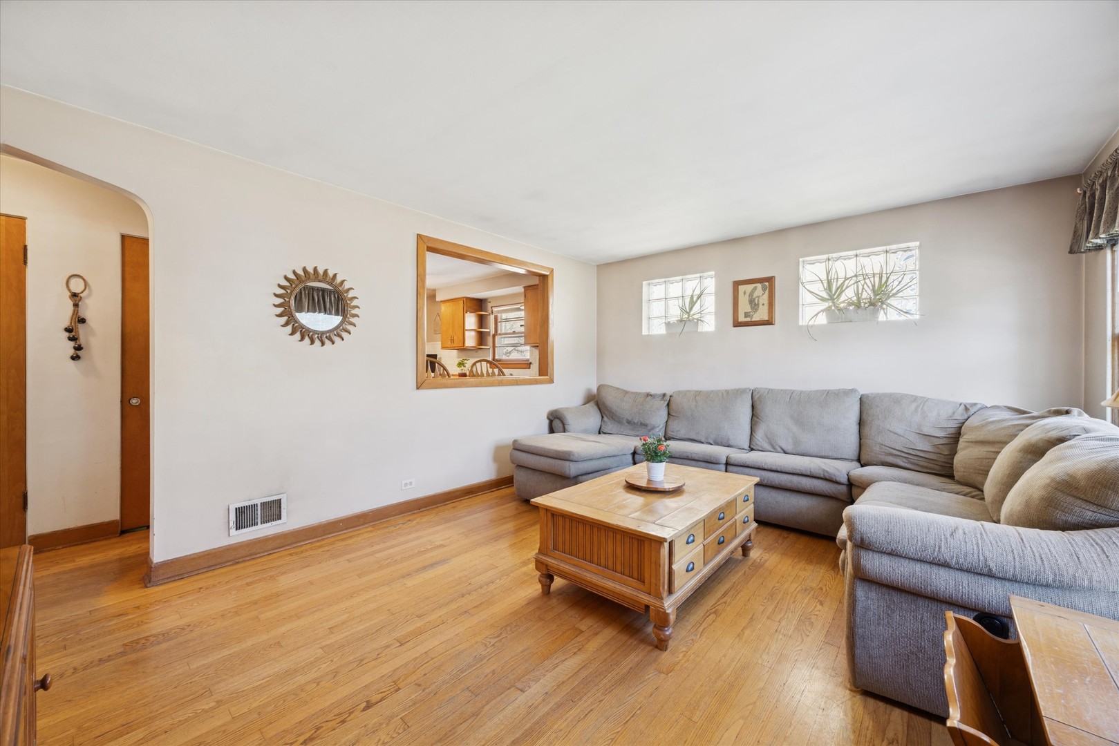3334 Prairie Avenue Brookfield, IL 60513 - Photo 2 of 18 a living room with furniture and a wooden floor