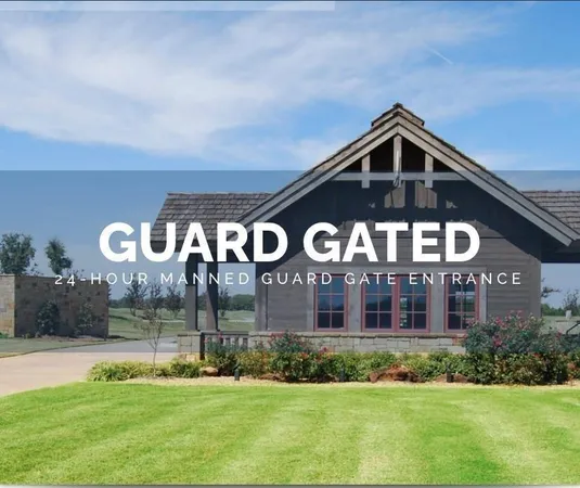 a view of a brick building with a yard