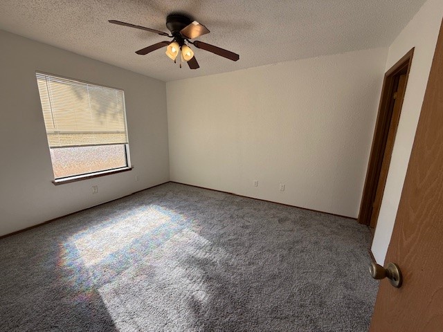 3000 Jadewood Court, Unit B Austin, TX 78748 - Photo 8 of 10 an empty room with windows and fan