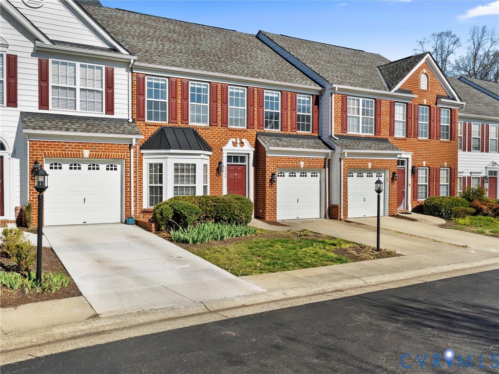 9524 Spring Moss Terrace, Unit 9524 Glen Allen, VA 23060 - Photo 2 of 41 front view of a house