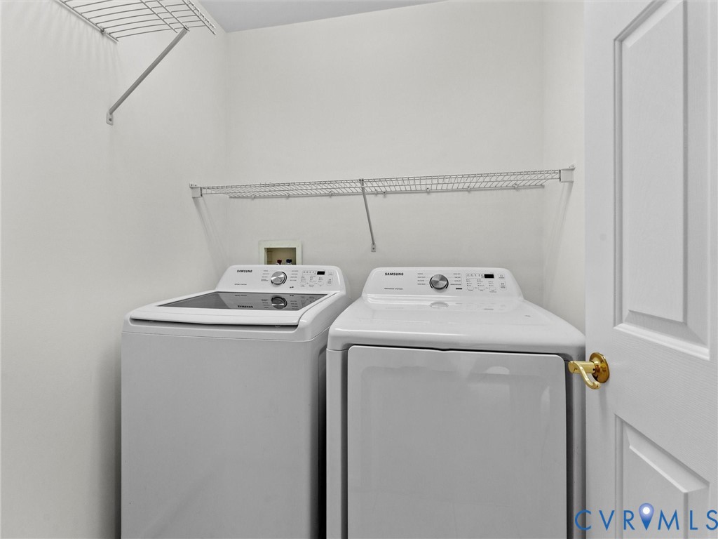 9524 Spring Moss Terrace, Unit 9524 Glen Allen, VA 23060 - Photo 32 of 41 a utility room with dryer and washer