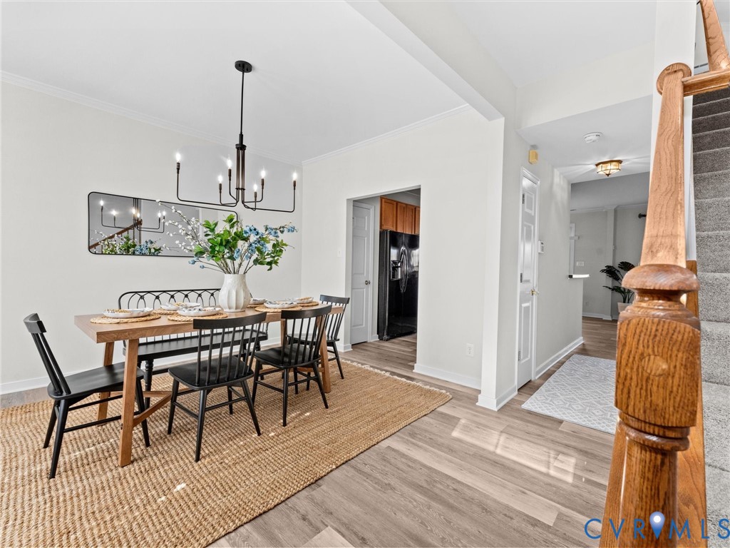 9524 Spring Moss Terrace, Unit 9524 Glen Allen, VA 23060 - Photo 6 of 41 a view of a dining room with furniture