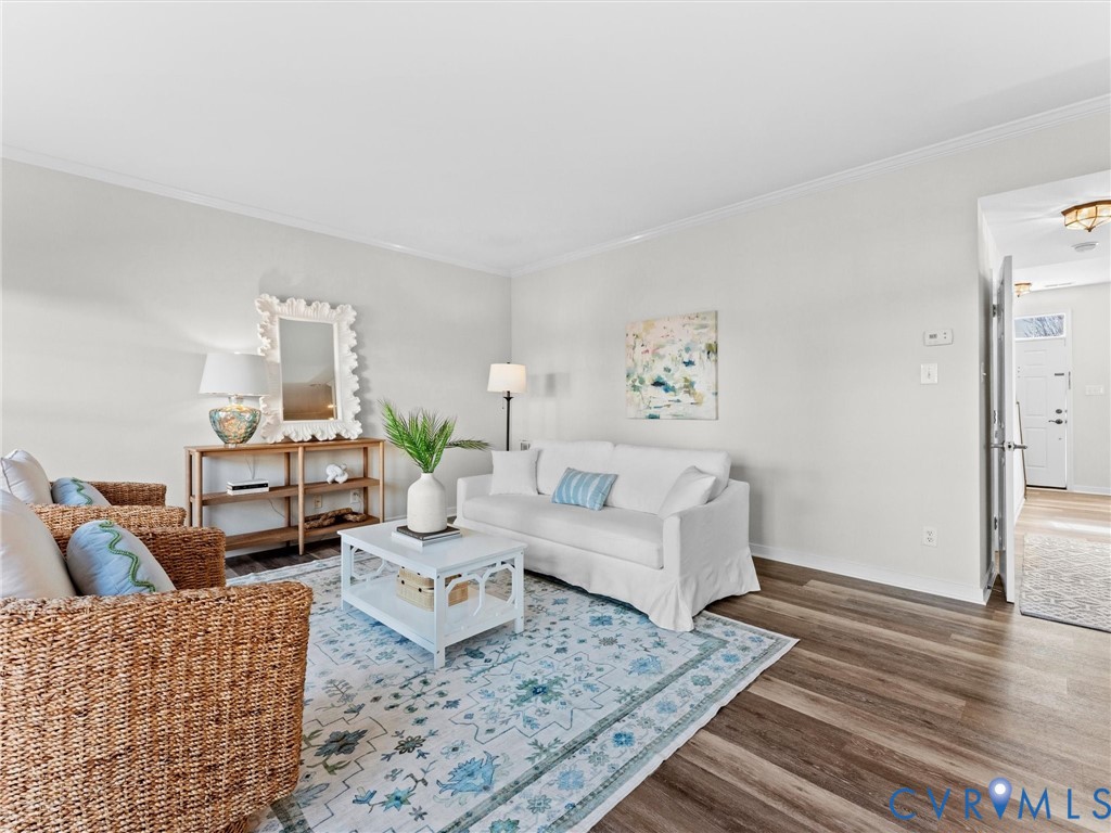 9524 Spring Moss Terrace, Unit 9524 Glen Allen, VA 23060 - Photo 10 of 41 a living room with furniture and wooden floor