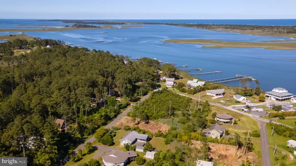 a view of a city with an ocean beach