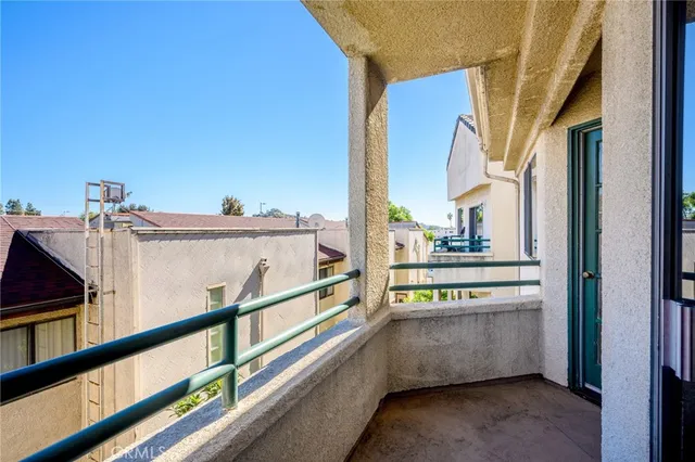 a view of a balcony with city view