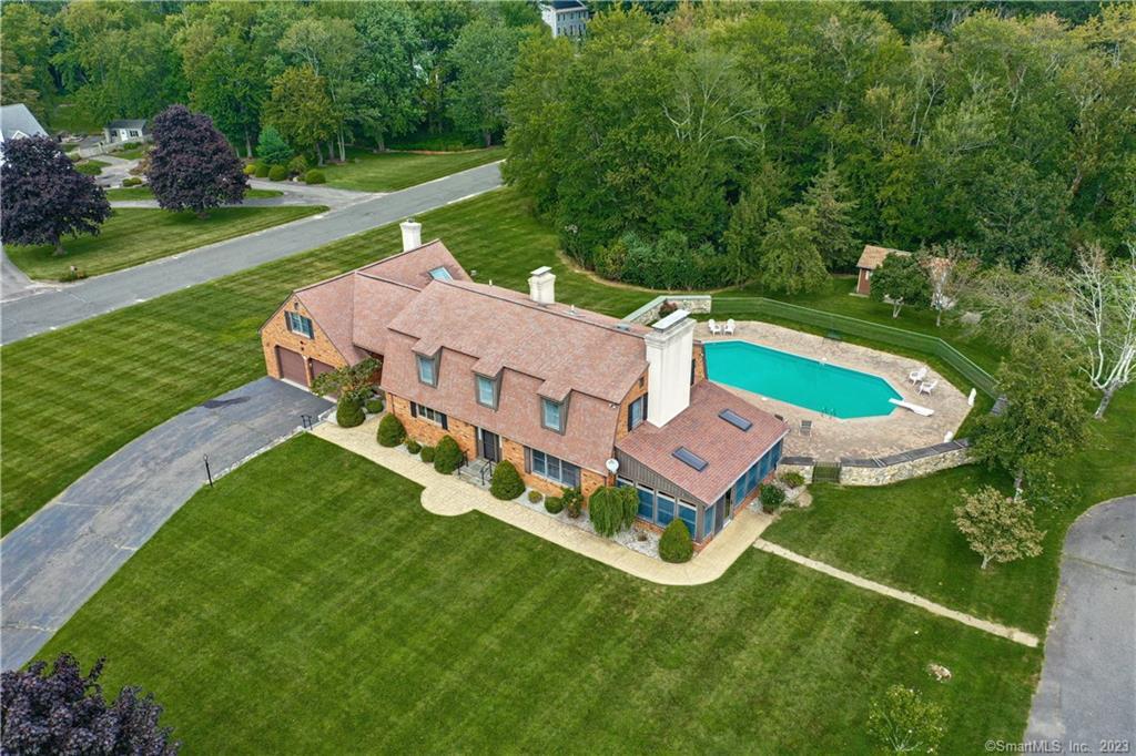 220 Highmeadow Road Watertown, CT 06795 - Photo 1 of 1 an aerial view of a house with a big yard