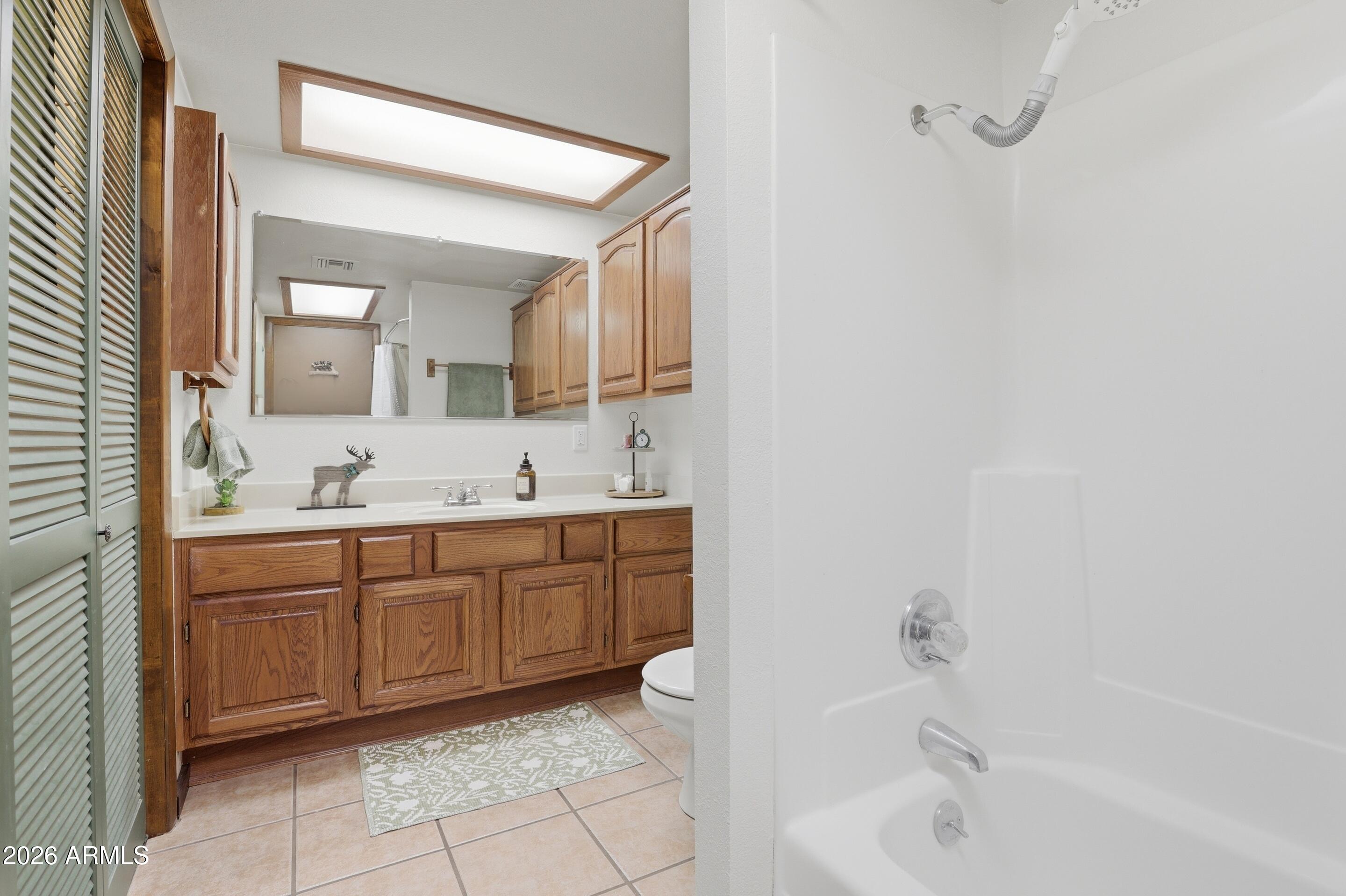 6740 Ridge Road Pine, AZ 85544 - Photo 17 of 35 a spacious bathroom with a tub sink and mirror
