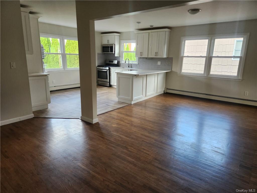 492 Main Street West Harrison, NY 10604 - Photo 2 of 10 updated kitchen opens to dining room/living room