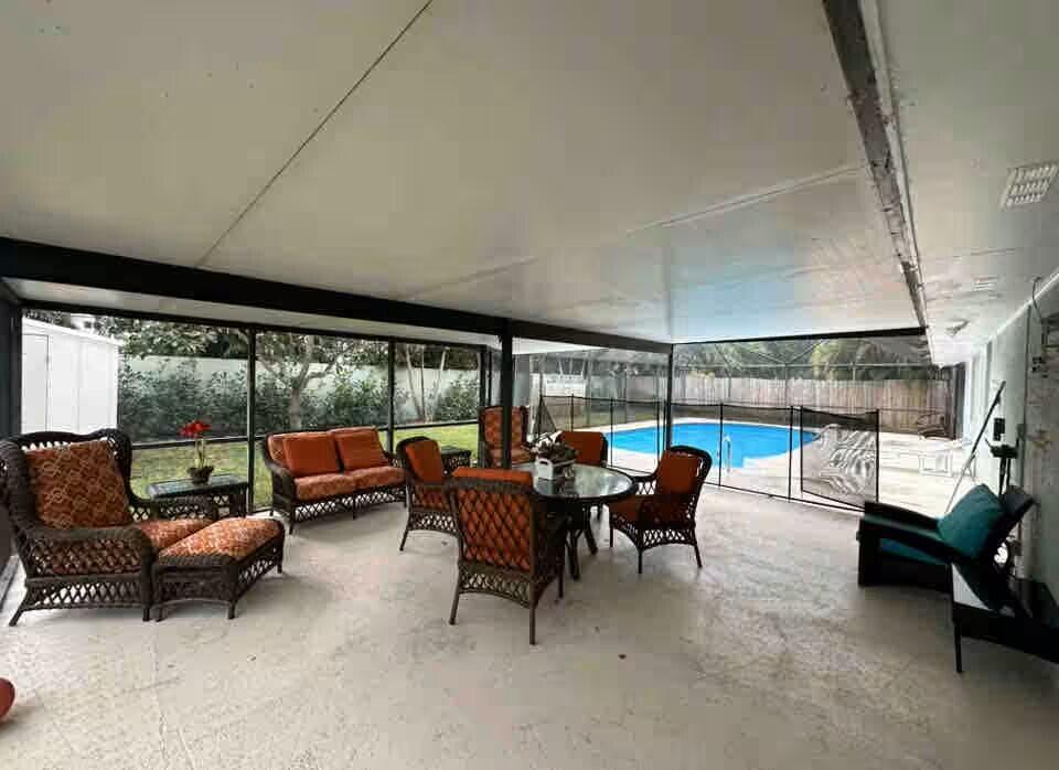 4796 Southeast Manatee Terrace Stuart, FL 34997 - Photo 3 of 18 covered patio