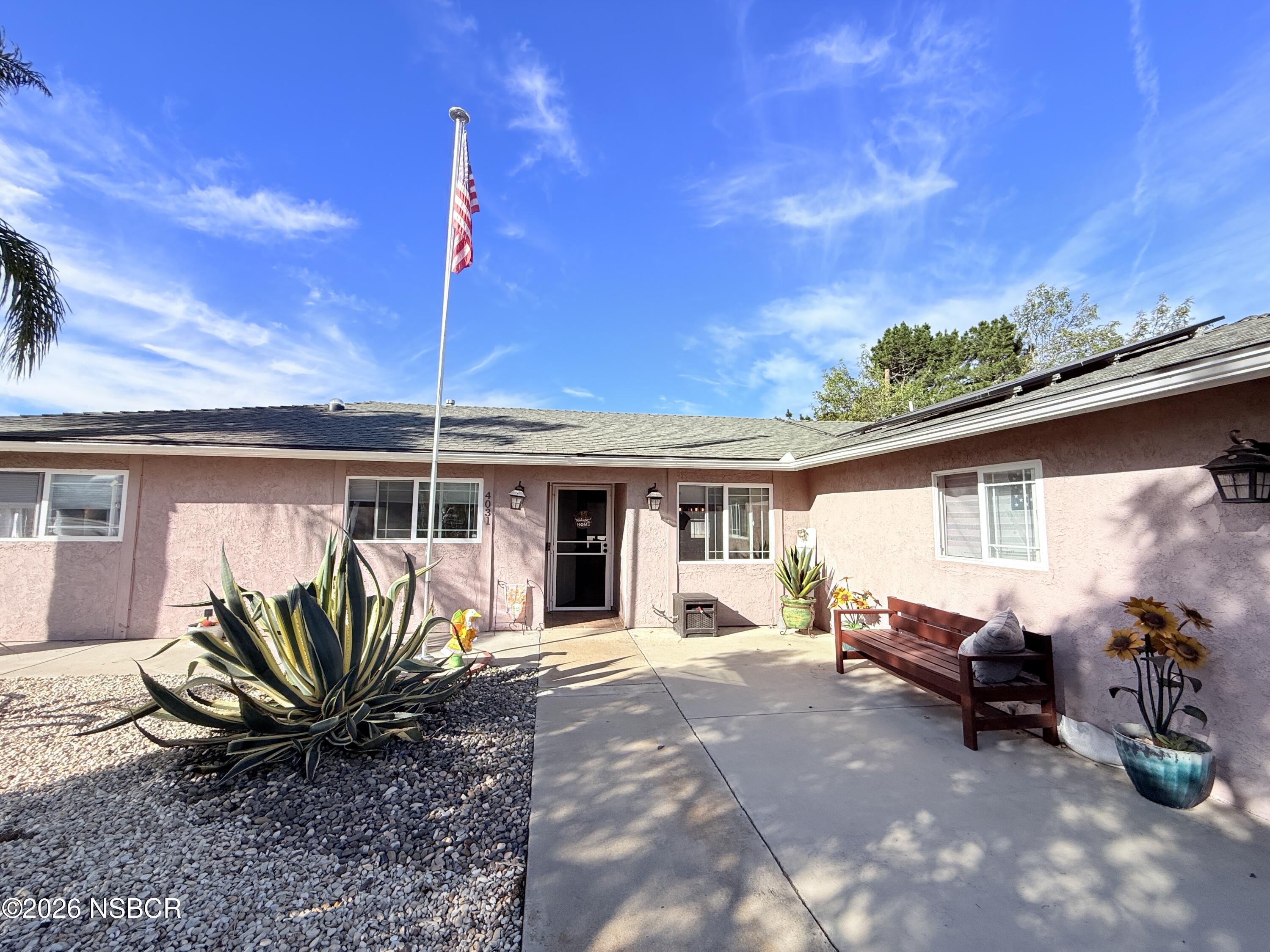 4031 Hillview Road Santa Maria, CA 93455 - Photo 15 of 16 a view of a house with backyard and sitting area