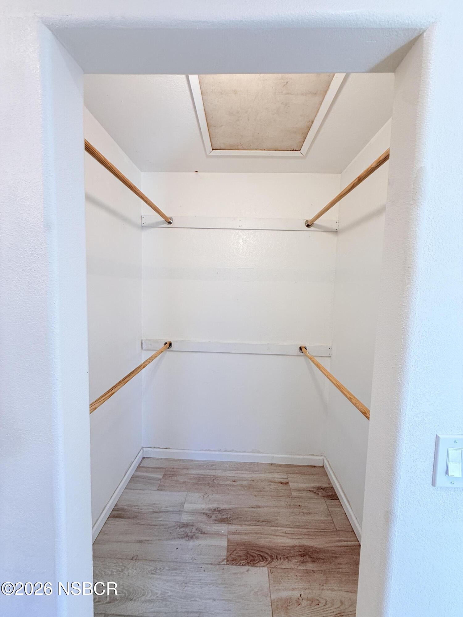 4031 Hillview Road Santa Maria, CA 93455 - Photo 9 of 16 a view of a room with racks on the wall