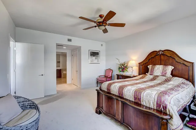 a view of a balcony with chair and table