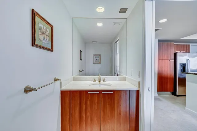 a view of a swimming pool with chairs