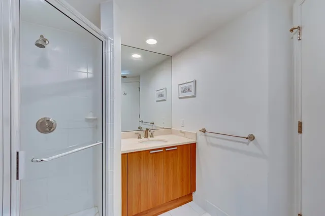 a multi story building with lawn chairs