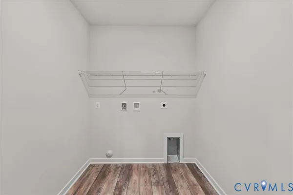 a view of a porch with wooden floor and windows