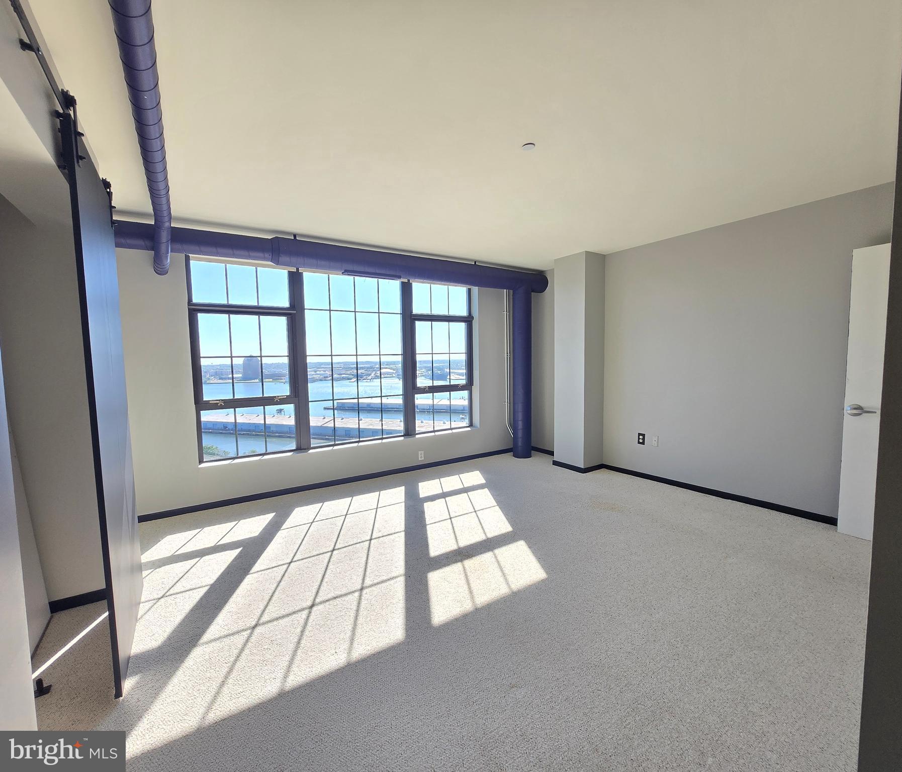 1200 Steuart Street, Unit 1913 Baltimore, MD 21230 - Photo 28 of 57 Guest suite with harbor views.