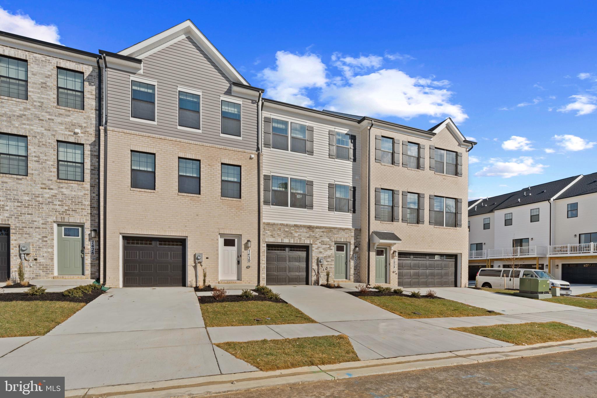 7512 Fern Gully Way Brandywine, MD 20613 - Photo 2 of 26 a front view of a building with street