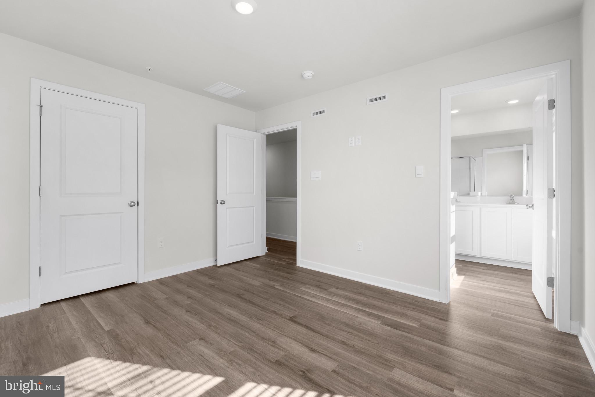7512 Fern Gully Way Brandywine, MD 20613 - Photo 22 of 26 wooden floor in an empty room