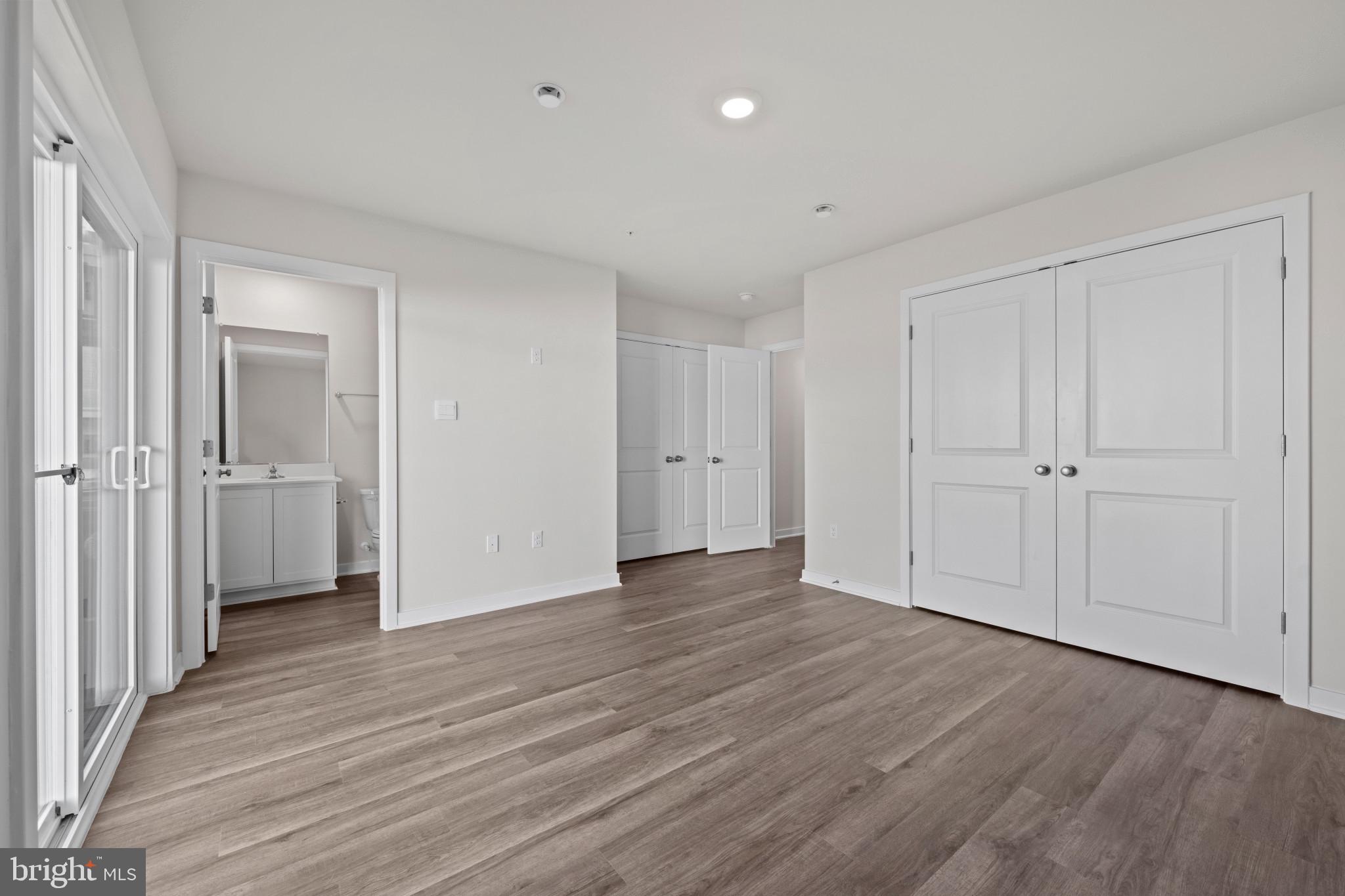 7512 Fern Gully Way Brandywine, MD 20613 - Photo 6 of 26 a view of a livingroom with wooden floor