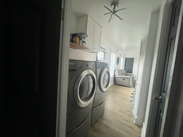 a view of a storage & utility room with washer and dryer
